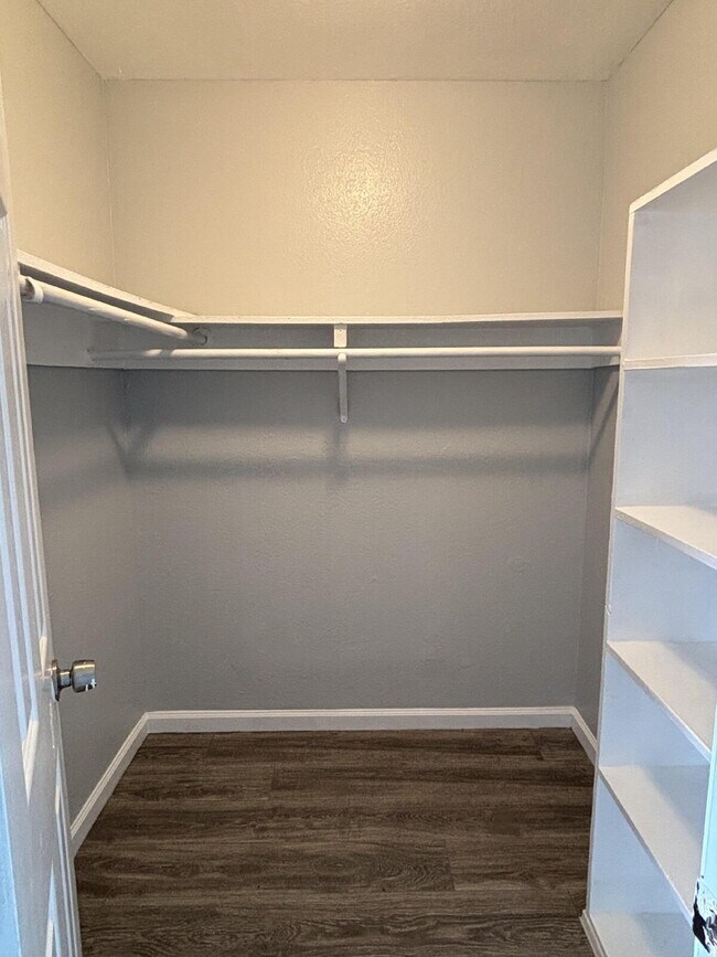 Building Photo - Corner & 1st Floor - Location, location, location! Become the newest neighbor at Palm Garden Apar...