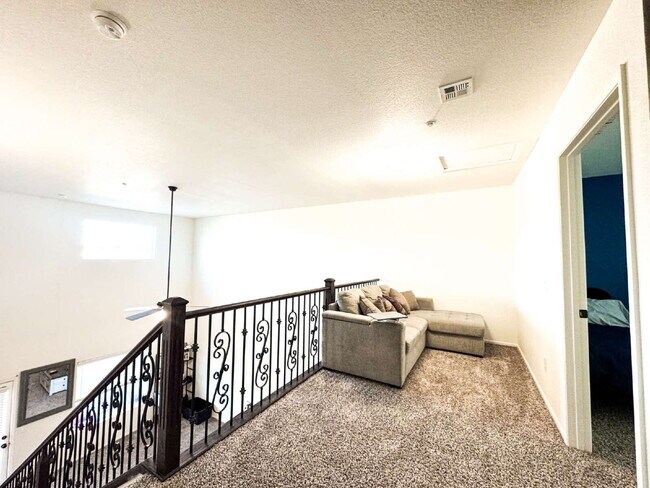 Building Photo - "Spacious 4-Bed, 3-Bath Condo in Desert Sky!"