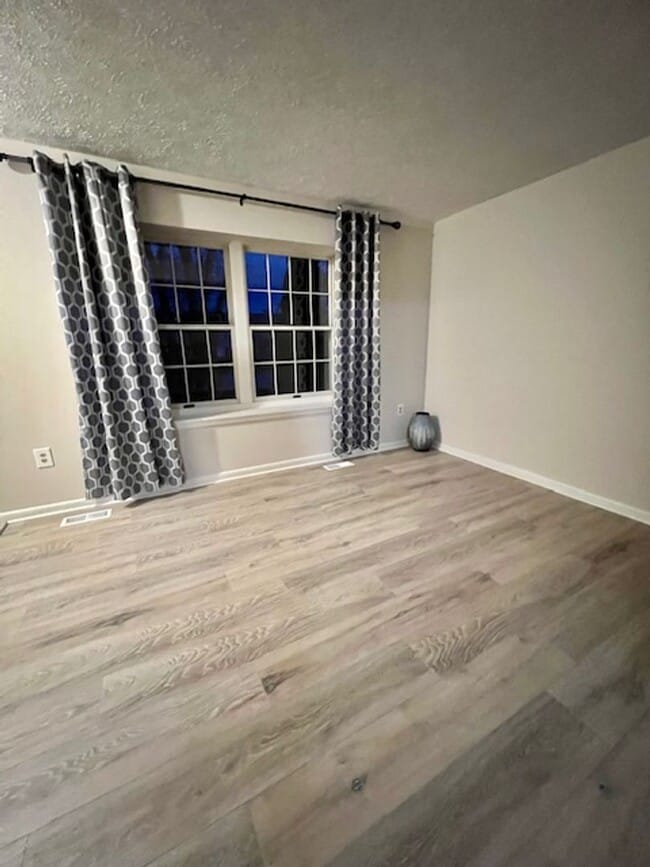 Building Photo - WELL MAINTAINED END UNIT TOWNHOUSE IN FARMBROOK