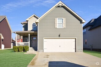 Building Photo - Pet Friendly Three Bedroom with Bonus!