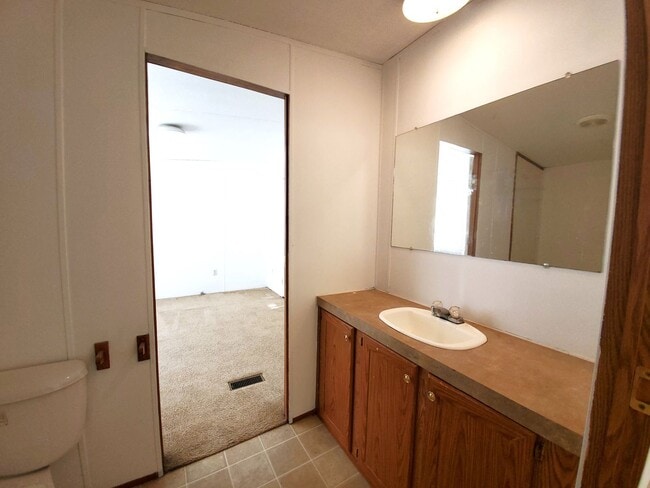 Building Photo - Spacious 4 bedroom with 3 FULL bathrooms nestled on 2 acres! MUST SEE!!!