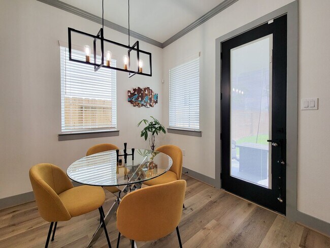 Building Photo - This 4-bedroom, 3-bathroom, two-story residence comes with a generous two-car attached garage. Re...