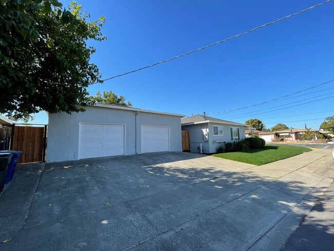 Building Photo - Huge yard with 4 car garage! Newly Remodel...