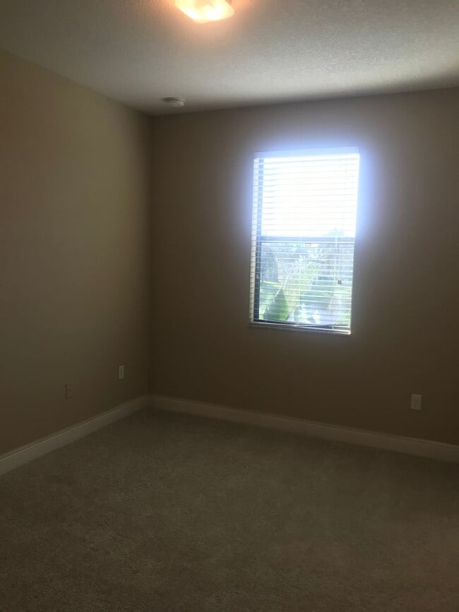 Building Photo - Lake Nona Townhome 3 Bed 2.5 Bath - Move in Special $500 off First Month Rent