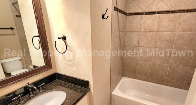Building Photo - Well-Planned 4BR/3BA—Space for Guests, Off...