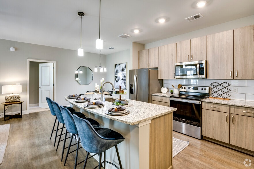 2BR, 2BA - 1,142SF - Kitchen - Argento at Riverwatch Apartments