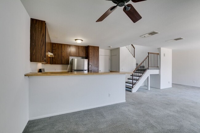 Building Photo - Double Primary Townhome with Spacious Backyard in 89115!