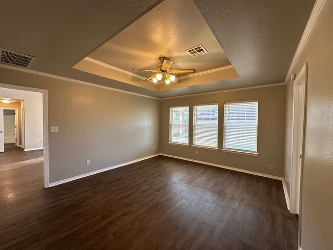 Building Photo - Clean, updated home on a corner lot with privacy fence and storage shed.