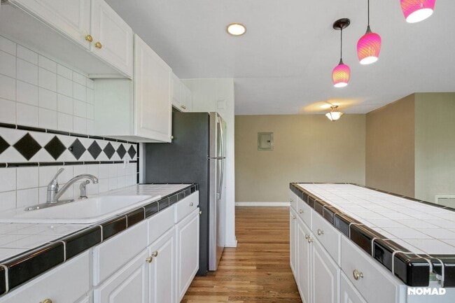 Building Photo - Charming 2BR Condo in Denver