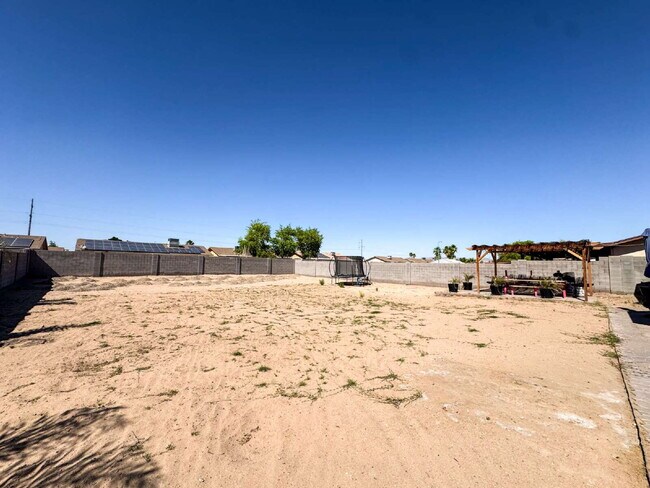 Building Photo - “Spacious 4-Bedroom, 2-Bath Home with Solar Panels in Yuma”