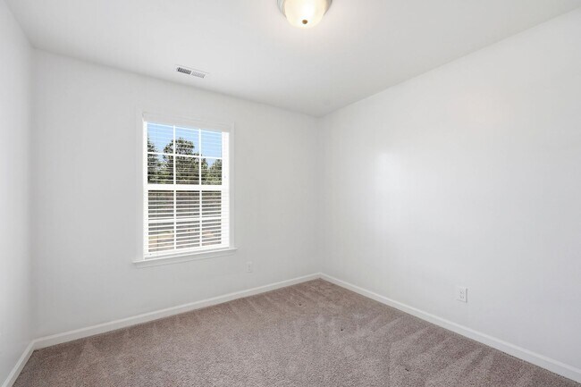 Building Photo - Modern 4BR Townhome with Washer/Dryer & Pet-Friendly Living in Morrisville!