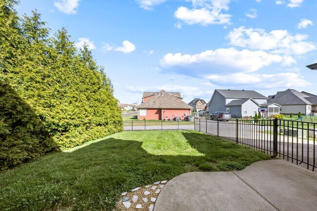 Building Photo - Pet Friendly Three Bedroom with Bonus!