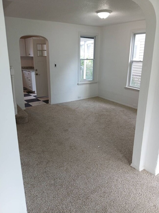Building Photo - Newly Renovated 4BR/1BA Single-Family Home with Garage – Cleveland