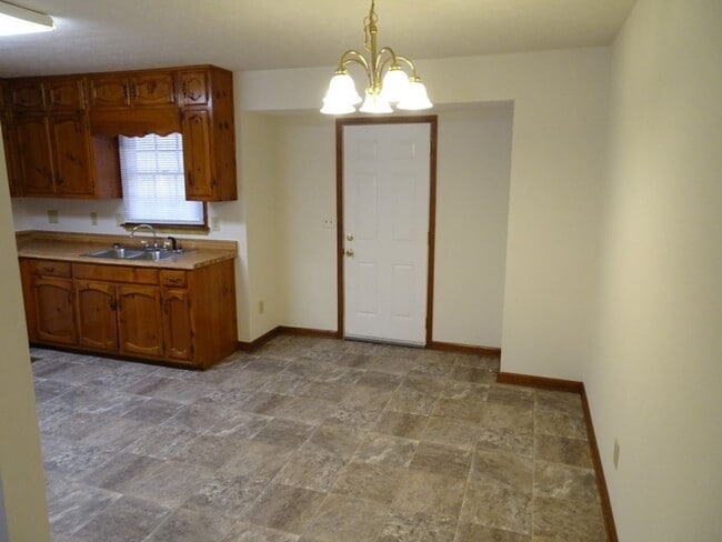 Building Photo - Great location, large wooded and fenced ya...