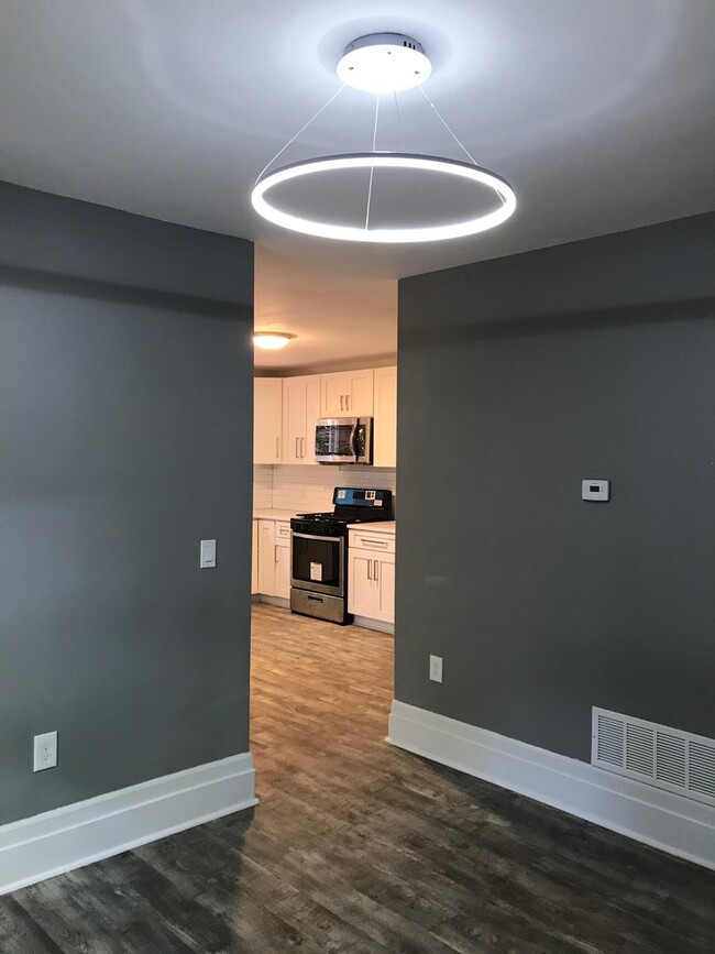 Building Photo - *GORGEOUS, completely updated single famil...