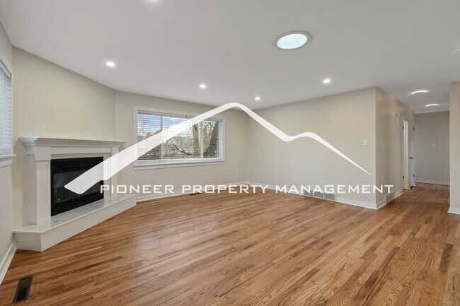 Building Photo - Beautifully Renovated Ranch Home with 2 Car Garage, AC, Garden Space & Prime Location