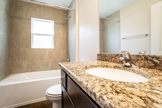 Building Photo - MOVE IN SPECIAL- Beautiful 3/2 Energy Effi...