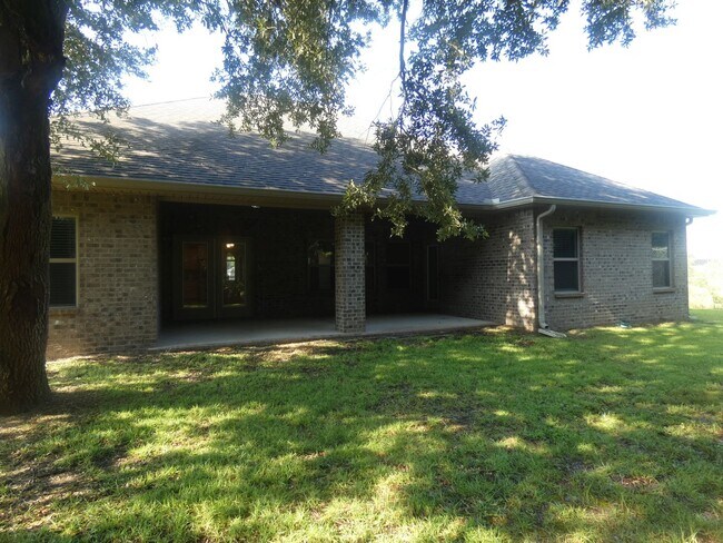 Building Photo - Spacious 5-Bedroom Home - Heart of Pace