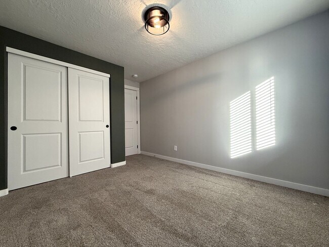 Building Photo - TAKE A LOOK A THIS GORGEOUS HOME NESTLED I...