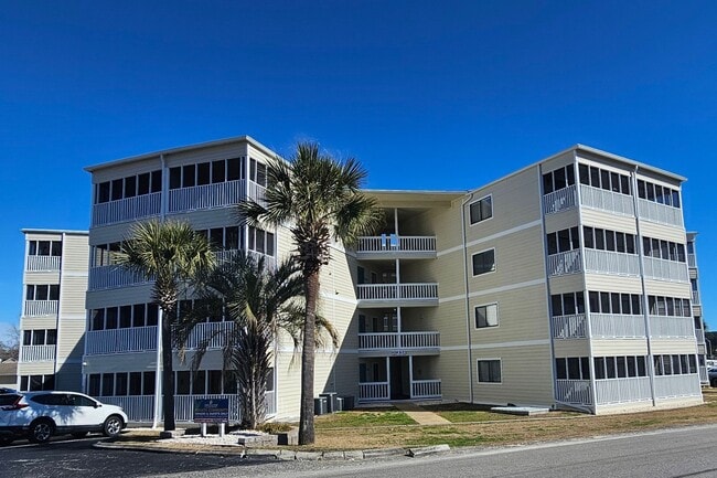 Building Photo - Dreamy Little River Condo — Furnished, Elevator Access, Pool & Marina Nearby!