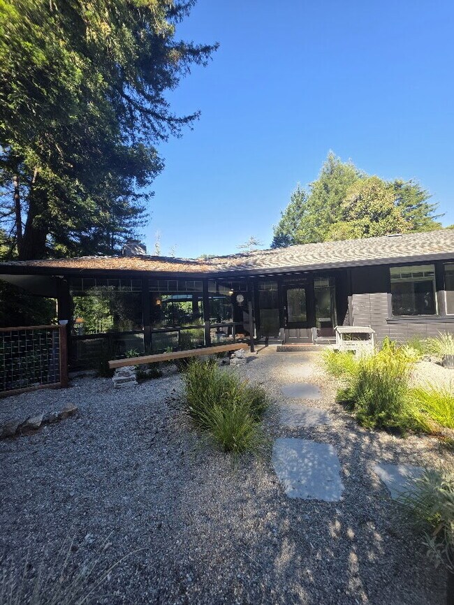 Building Photo - Breathtaking Home offers flexible living with bonus rooms ideal for an office, art studio, gym, o...