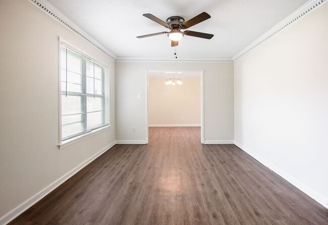 Building Photo - Spacious Renovated Home with Fenced Yard !