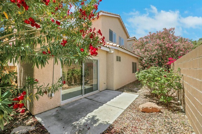 Building Photo - This beautifully updated 2-bedroom home is nestled in a gated community