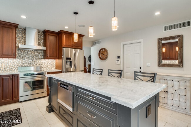 Building Photo - 10675 E Cinnabar Ave