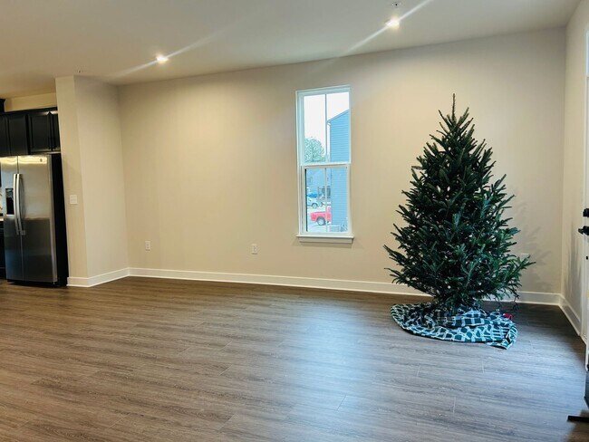 Building Photo - New Construction • 4 BR • 2 Full / 2 Half BA • End Unit Townhome in Village Town – Fayetteville’s...