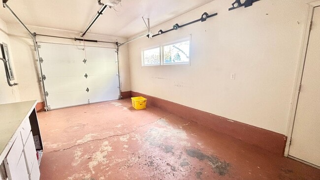 Building Photo - Recently Renovated House With Fenced Back Yard, Attached Garage, and Basement