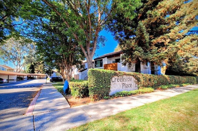 Building Photo - Spacious Second Floor 1bd Condo With Laundry In Unit, Pool, Balcony, & Carport!