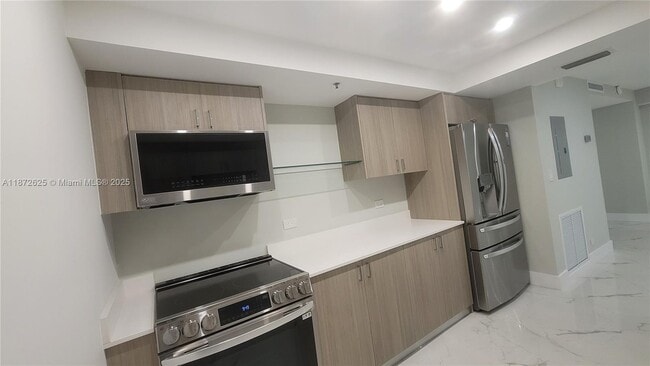 Building Photo - 6039 Collins Ave