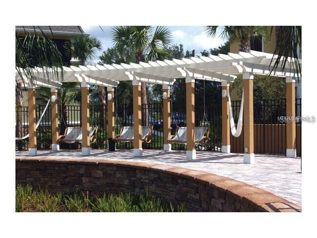 Building Photo - 10205 Courtney Palms Blvd