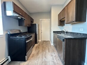 Building Photo - 5645-5657 W Washington Blvd