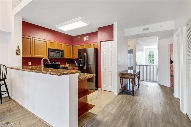 Building Photo - 10127 Villagio Palms Way