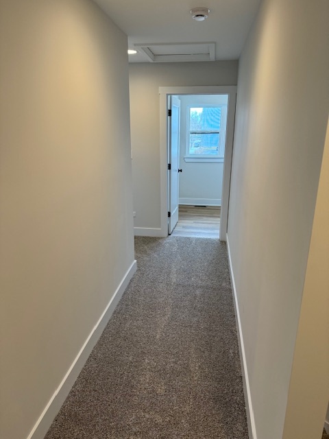 Hallway - Laundry Room ahead, Master Bedroom to the left - 12 W 4th St