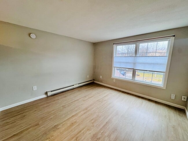 Building Photo - Price Improvement! $1500 Hot Water Included | Looking for the perfect studio in Dover with a pool...