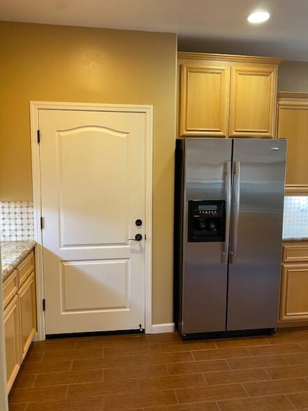 Kitchen door to Garage - 1000 Orleans Ct
