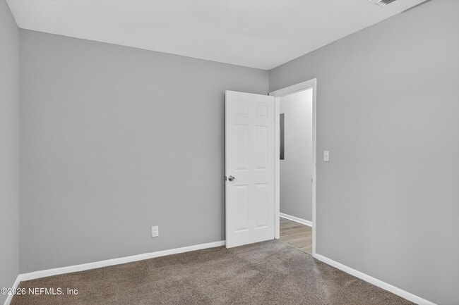 Building Photo - 6955 Miss Muffet Ln S