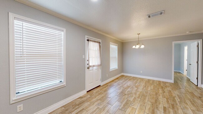 Building Photo - Completely repainted 4 bedroom ALL TILE ho...