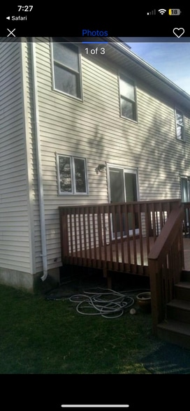 Back of unit with deck - 14 Windwood Dr