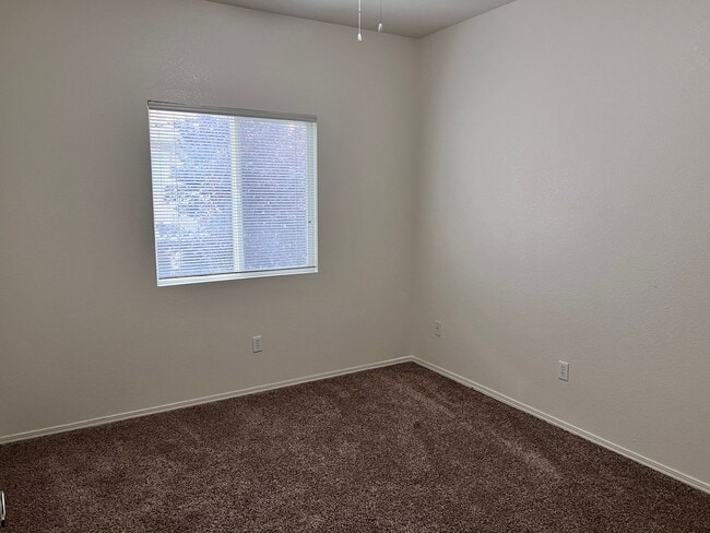 Building Photo - Wonderful 3 Br condo in gated community with the major appliances and 1 car garage.