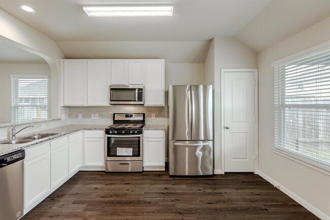 Building Photo - 4922 Blue Jacaranda Wy