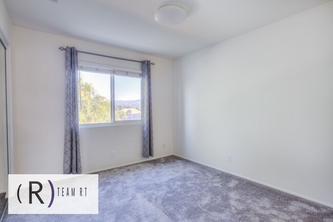 Building Photo - A Captivating and Charming 2 Story Home Ne...