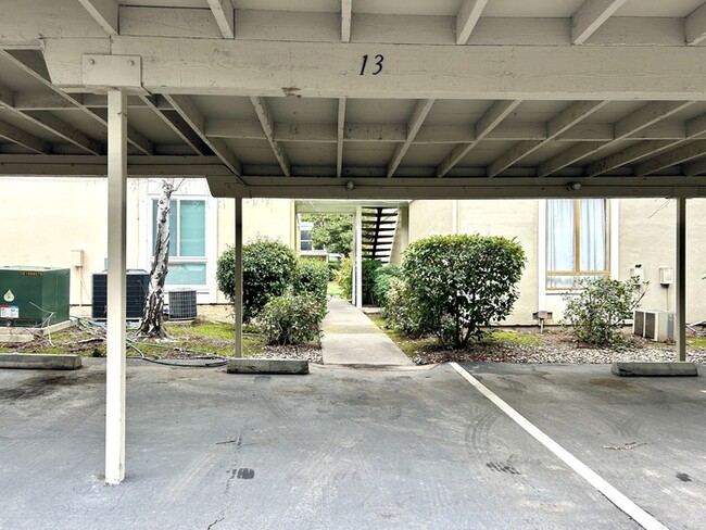 Building Photo - Beautiful Downstairs 2 Bedroom Condo Located In Gated Community Pool + Lake Access!