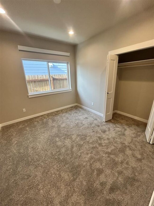 Building Photo - Brand New Construction Three Bedroom Condo...