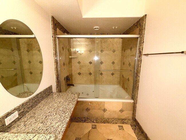 Building Photo - Riverwalk Tower 2 Bedroom Condo - 2 Parking Spaces/Private Laundry