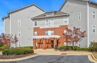 Building Photo - Capstone Quarters 2 Bed 2 Bath Condo! Fully Furnished!