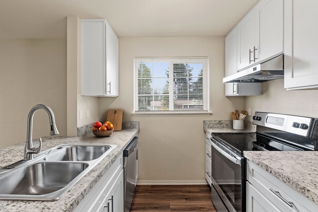 Explore the elegance of this modern kitchen, designed for style and functionality. - Monte Vista Apartments