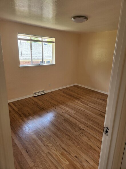 Building Photo - 8779 W 63rd Pl